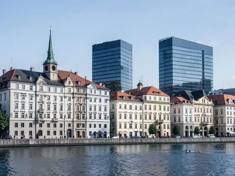 Old town facades beside contemporary office towers in Bratislava, Slovakia